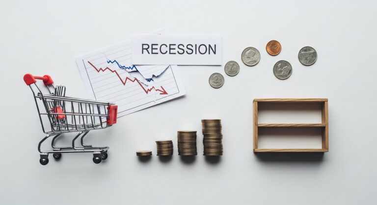 Featured illustration of recession affecting personal finances and careers: falling stock graph, coins, and worried professional.