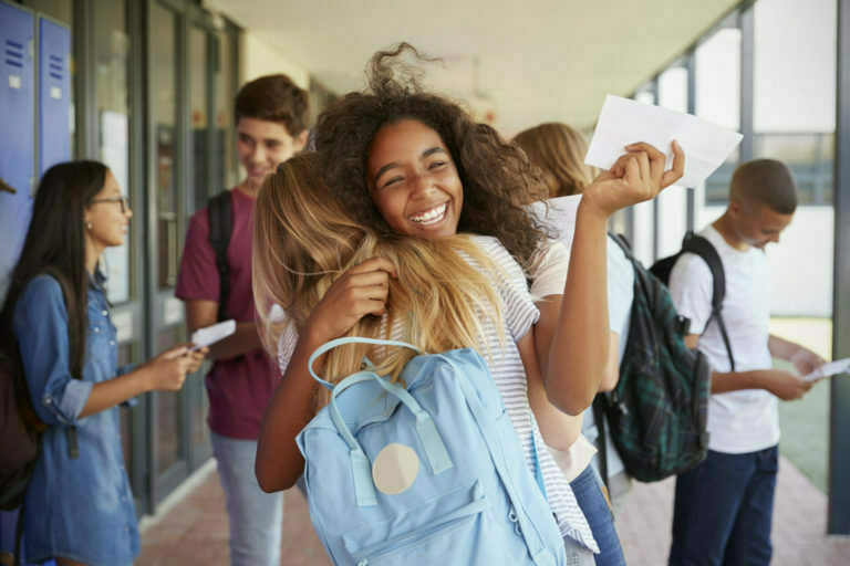 two girls on a school hallway